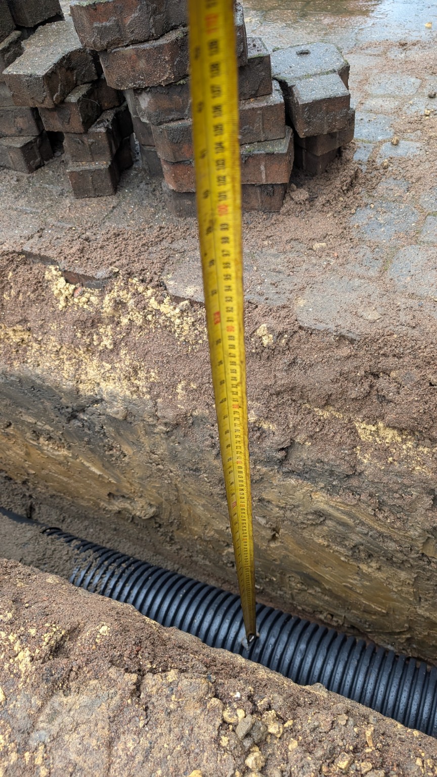 Checking the trench depth