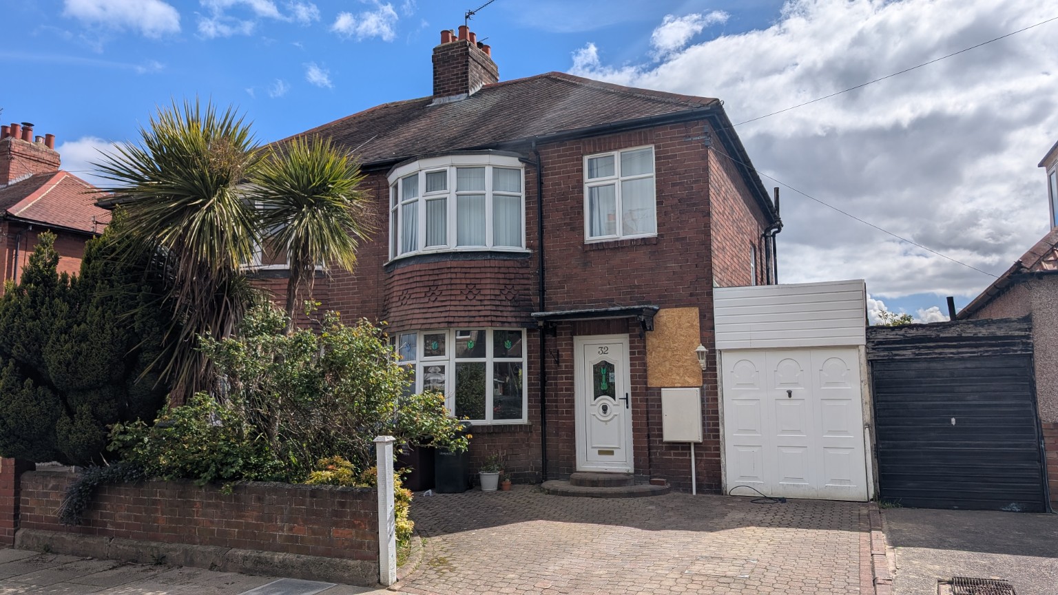 Front elevation of the 1930s semi-detached house before renovation