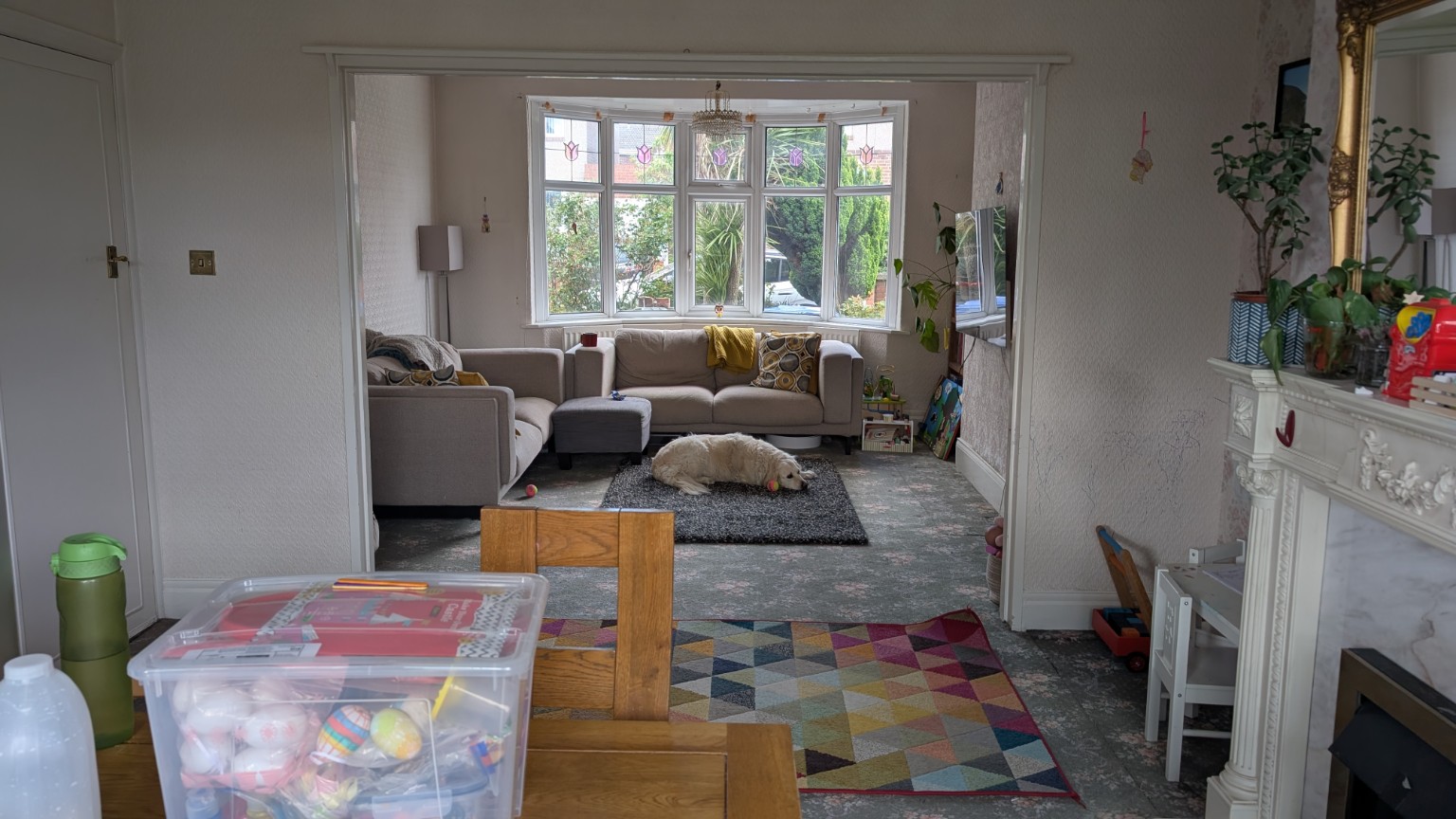 Original interior before renovation, showing the flowery carpet